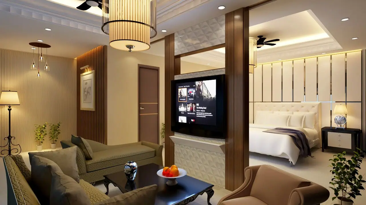 A modern bedroom suite with a sitting area and television